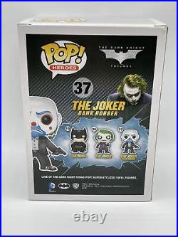 Funko Pop! The Joker Bank Robber #37 The Dark Knight. Pop has paint defect